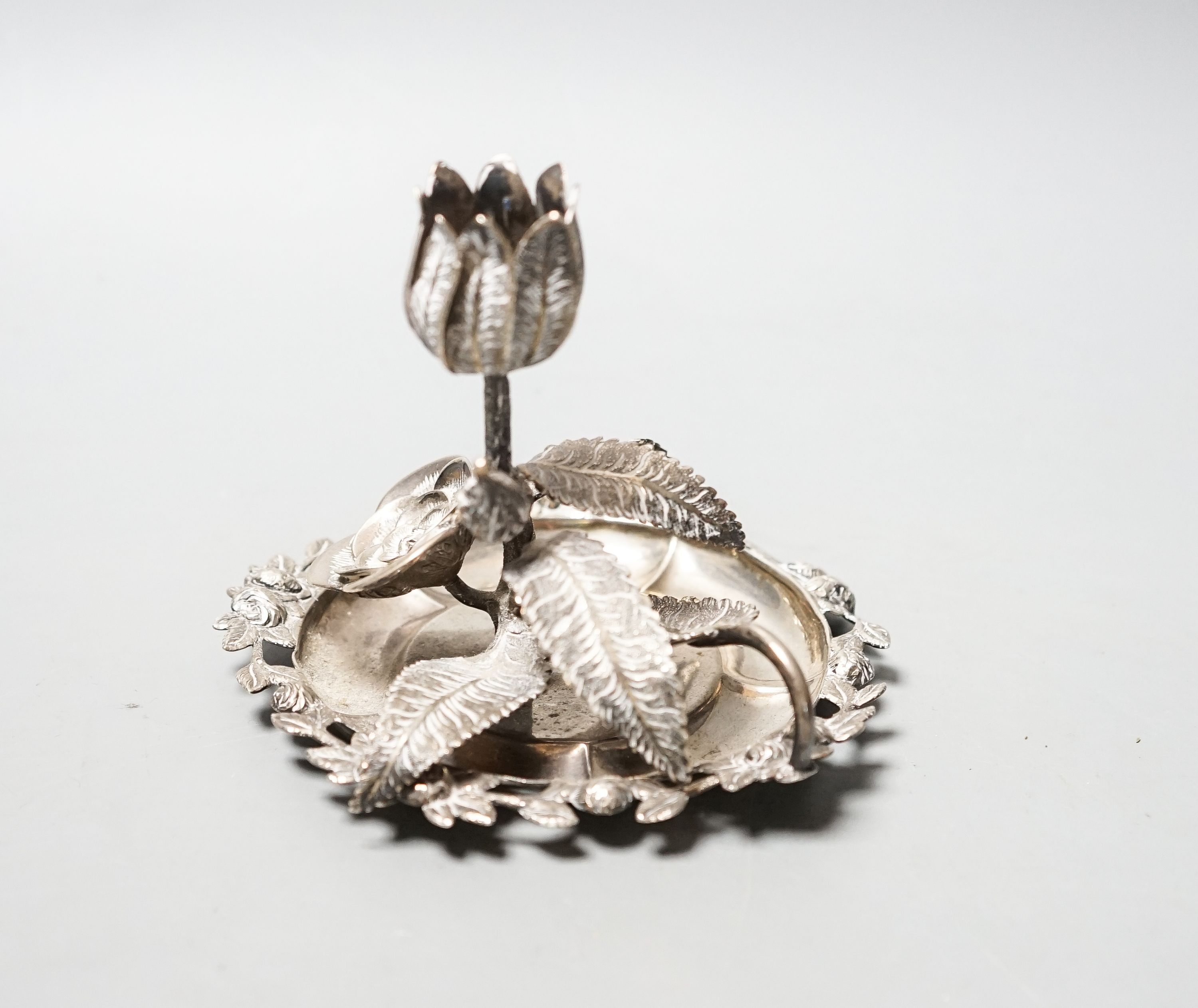 A George IV silver ‘rose’ chamberstick by Sampson Mordan and George Riddle, London, 1829, diameter 11.5cm, 186 grams.